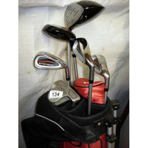 134 - A set of golf clubs