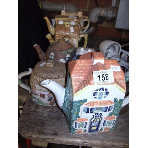 158 - 7 collector's teapots