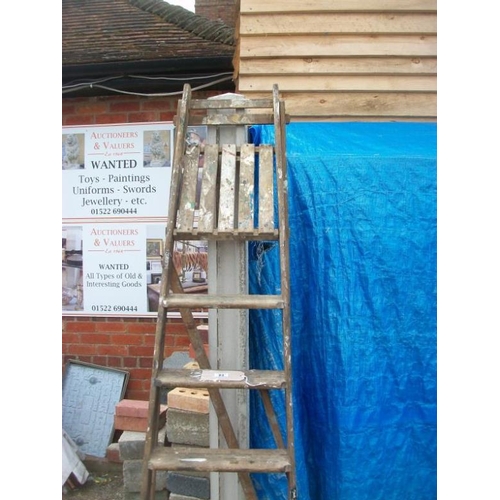 23 - A wooden step ladder