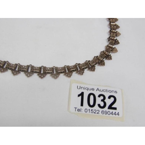 1032 - A gold chain marked 9ct (approx. 18g)