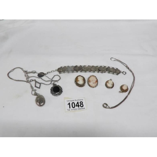 1048 - A mixed lot of jewellery including silver and cameos