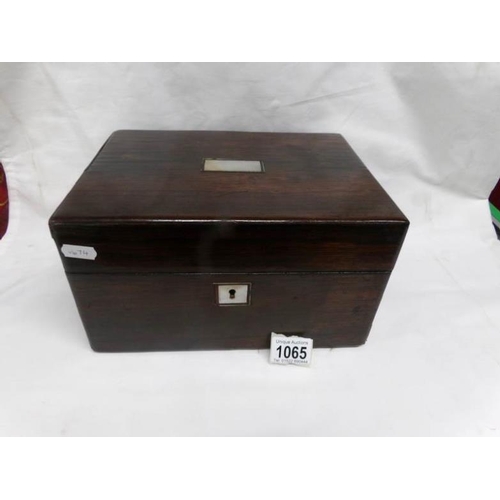 1065 - A 19th century rosewood vanity case complete with contents