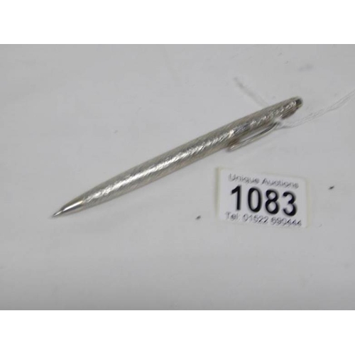 1083 - A silver ball point pen