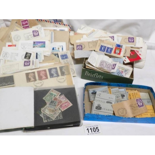 1105 - A tin of UK stamps including First day covers, Victorian penny reds and high value