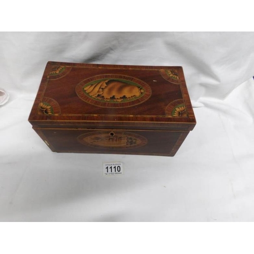 1110 - A mahogany box with shell inlay