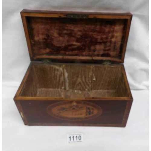 1110 - A mahogany box with shell inlay