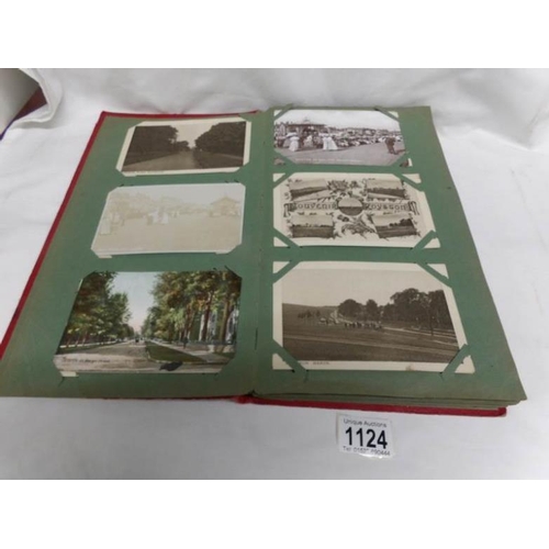 1124 - A red postcard album of approximately 150 postcards, mainly Edwardian, Essex, topographical etc