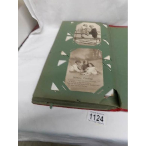 1124 - A red postcard album of approximately 150 postcards, mainly Edwardian, Essex, topographical etc