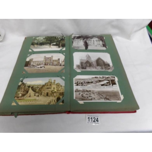 1124 - A red postcard album of approximately 150 postcards, mainly Edwardian, Essex, topographical etc