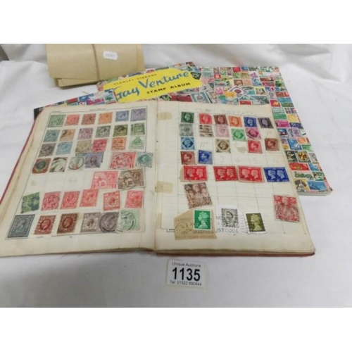 1135 - 4 albums of world stamps including many Victorian (i.e penny reds), envelopes and stamps  (proceeds ... 