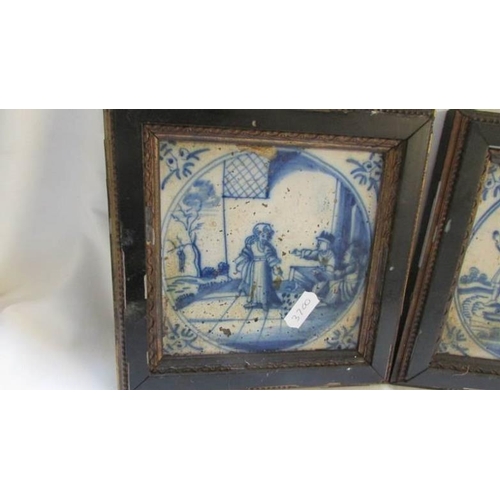 115 - A pair of framed 18th century Delft blue and white tiles