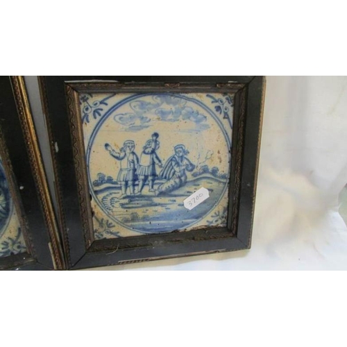 115 - A pair of framed 18th century Delft blue and white tiles