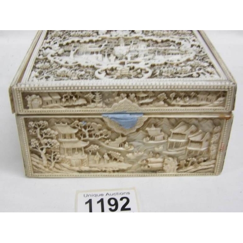 1192 - A heavily carved antique ivory box, carved on all sides and top, 11 x 14 x 7.5cm