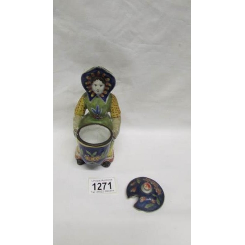 1271 - A 19th century Delft figure of a lady holding a pot (age cracks on inside of pot)