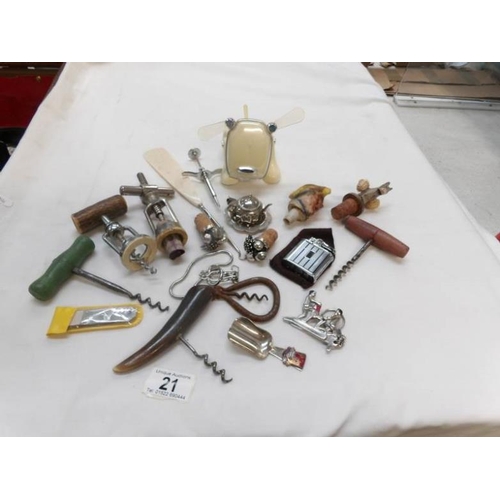 21 - A mixed lot of old corkscrews, bottle corks etc