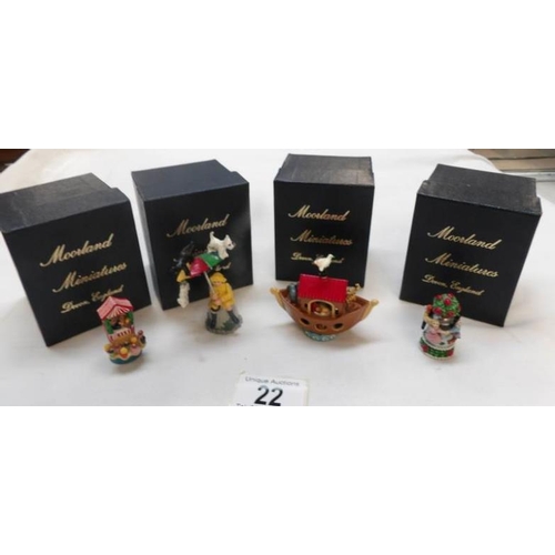 22 - 4 interesting boxed articulated Moorland miniature thimbles including Punch and Judy