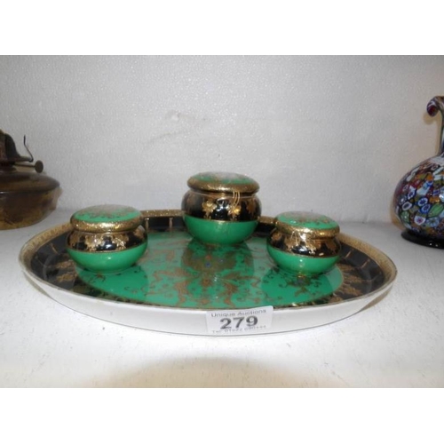 279 - A Noritake 4 piece dressing table set