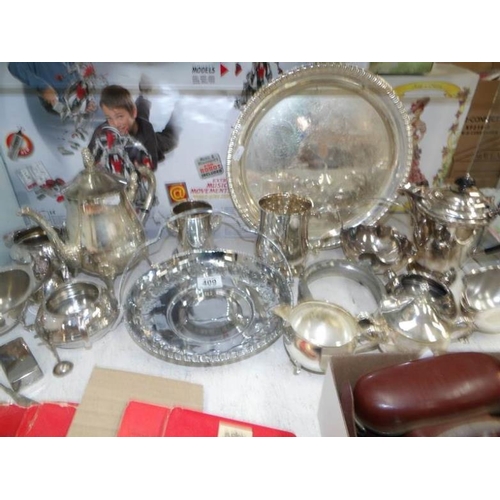 409 - A mixed lot of silver plate including coffee set, sauce boats etc