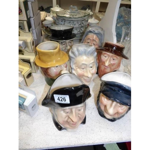 426 - 7 Kingston pottery character jugs (1 with slight chip)