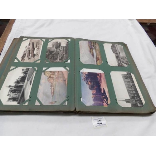 48 - An Edwardian postcard album containing approximately 200 post cards