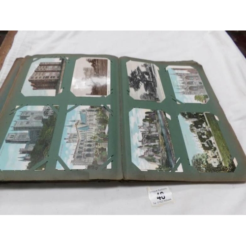 48 - An Edwardian postcard album containing approximately 200 post cards