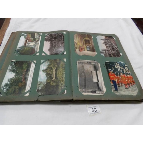 48 - An Edwardian postcard album containing approximately 200 post cards