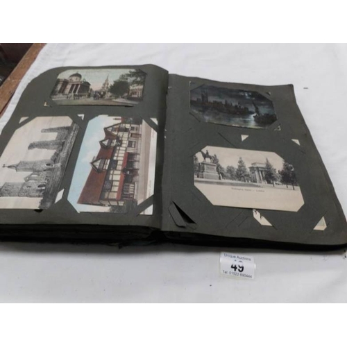 49 - An Edwardian postcard album containing approximately 260 postcards