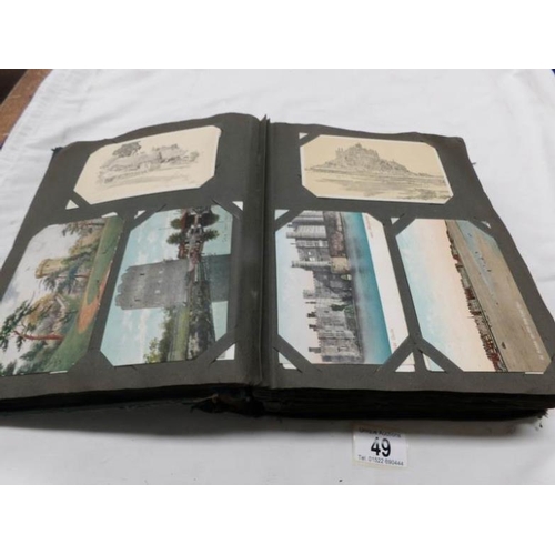 49 - An Edwardian postcard album containing approximately 260 postcards