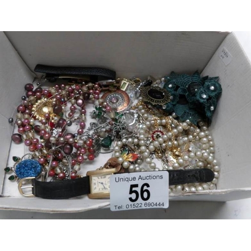 56 - A mixes lot of costume jewellery including necklaces, brooches etc