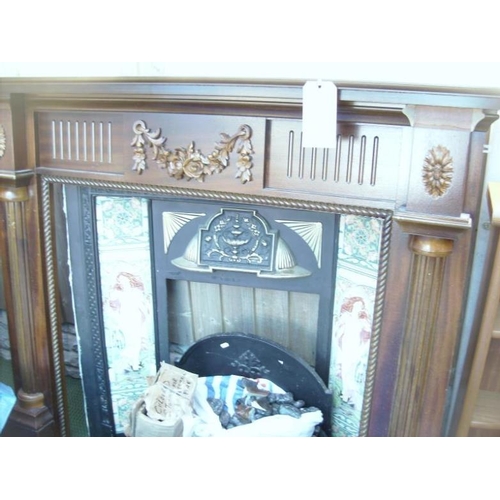 56 - A fire surround with tile surround