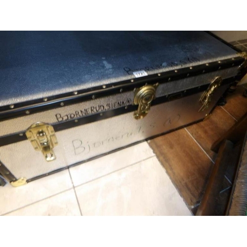 1721 - A large metal travelling trunk