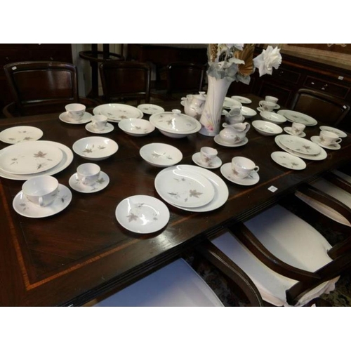 1732 - Approximately 50 pieces of Royal Doulton 'Tumbling Leaves' tea and dinner ware