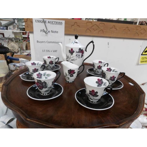 434 - A Royal Albert 'Masquerade' coffee set (missing sugar bowl)