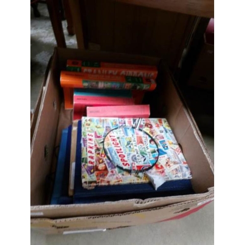 529 - A box of stamp albums and stamp books