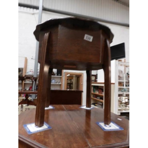 539 - An oak sewing table