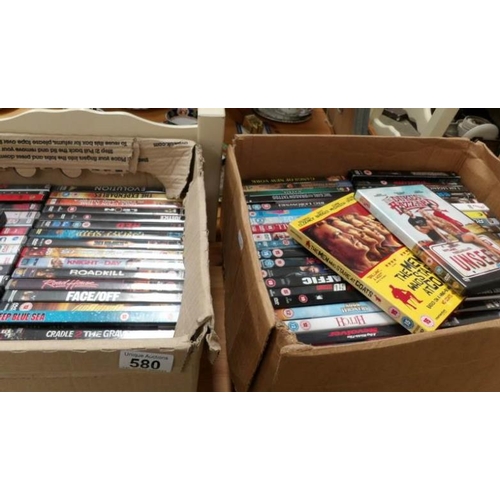 580 - 2 boxes of DVD's including some new