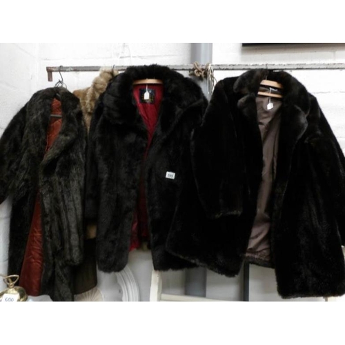 599 - 4 fur coats and one other