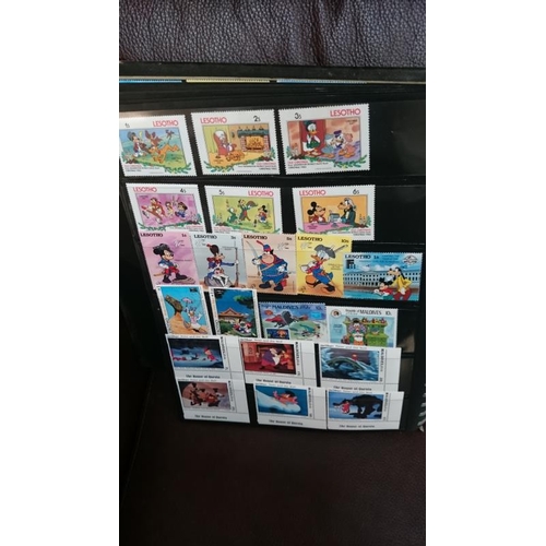 132 - A folder of Disney related stamps