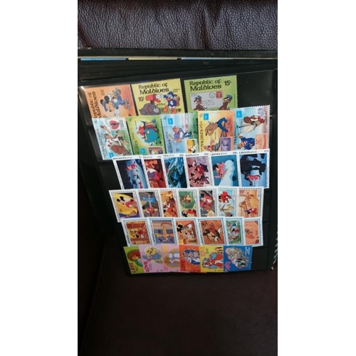 132 - A folder of Disney related stamps