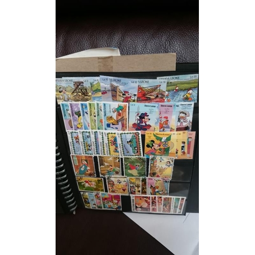 132 - A folder of Disney related stamps