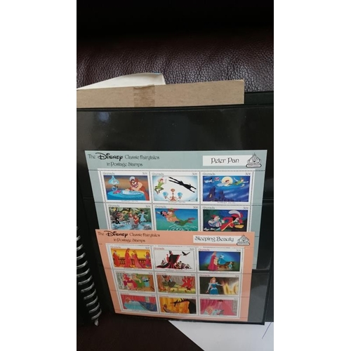 132 - A folder of Disney related stamps