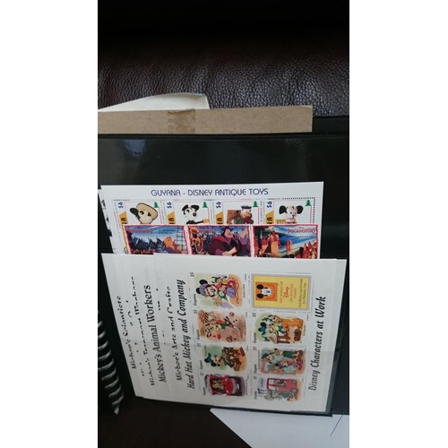 132 - A folder of Disney related stamps