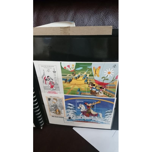 132 - A folder of Disney related stamps