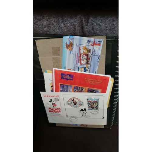 132 - A folder of Disney related stamps