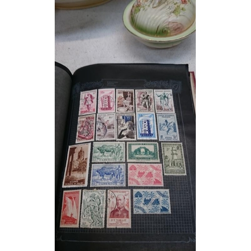 349 - 2 albums of British and world stamps