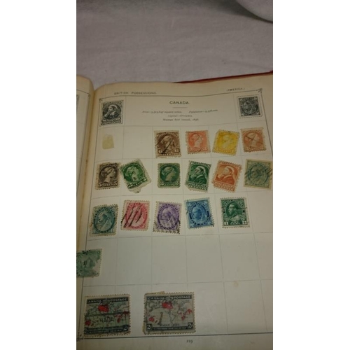 1104 - An album of stamps including Victorian penny reds, Australia Territories, Europe, USA etc