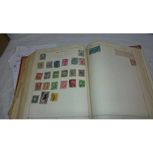 1104 - An album of stamps including Victorian penny reds, Australia Territories, Europe, USA etc