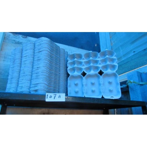 107A - A quantity of egg boxes