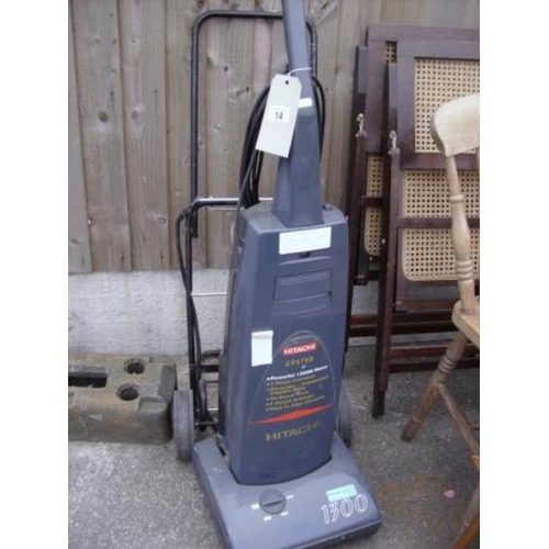 14 - A Hitachi vacuum and a trolley bag