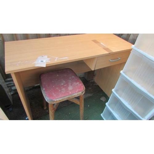 88 - A computer table and chair